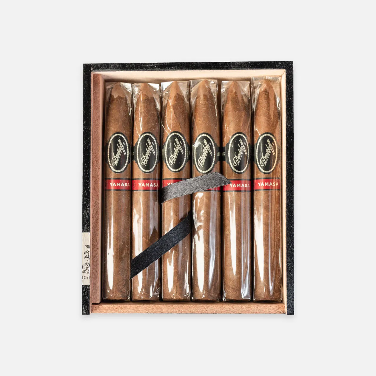 Davidoff Yamasá cigars in elegant black and red packaging.