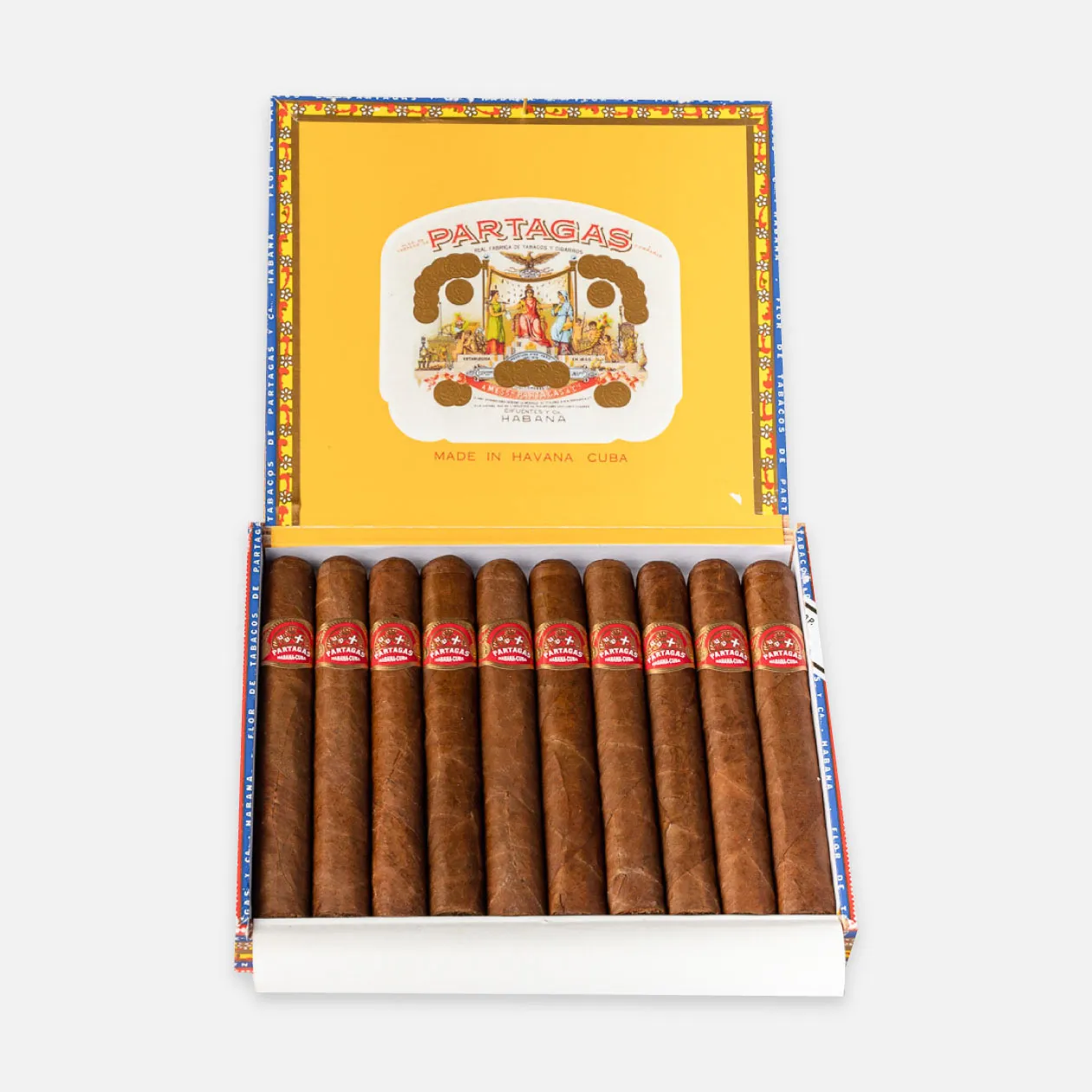 Partagas Cuban cigars in a vibrant, decorative box.