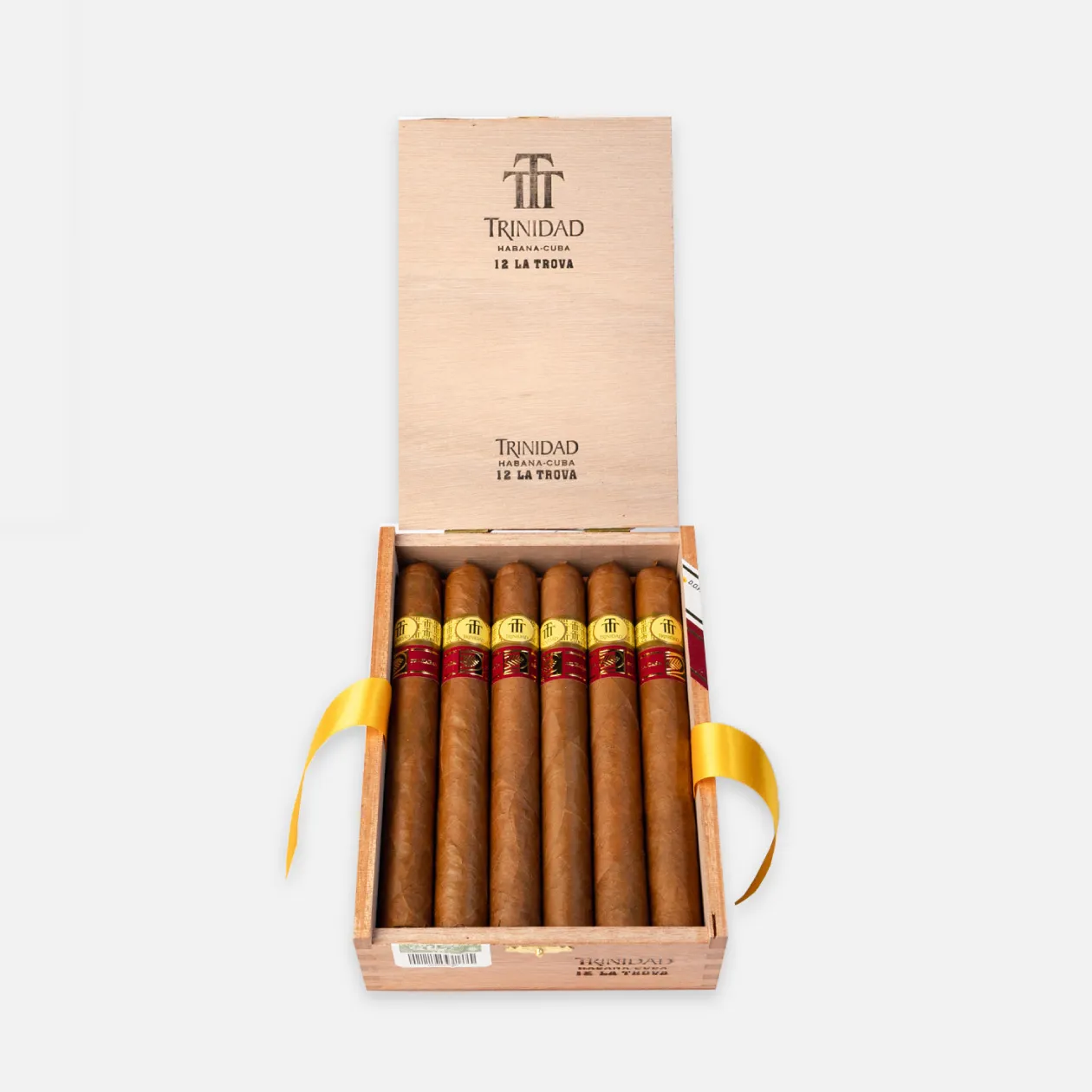 Trinidad 12 La Trova cigars in an elegant wooden box.