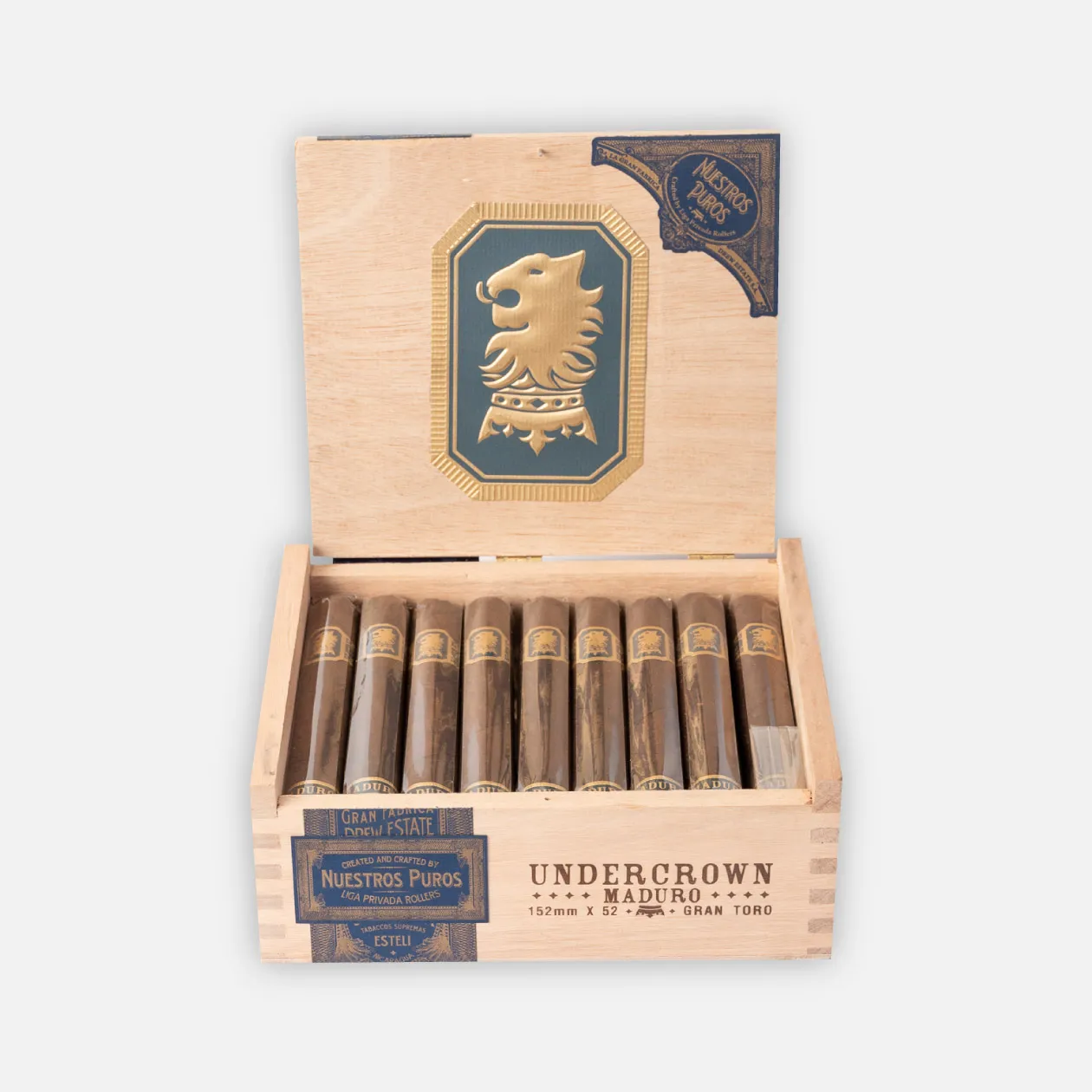 Undercrown Maduro Gran Toro cigars in an elegant wooden box.